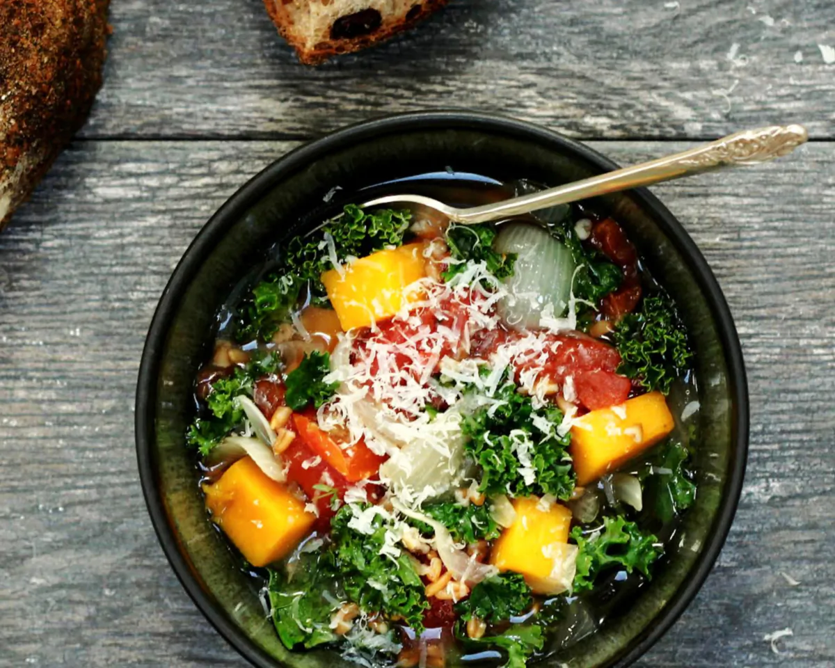 This warming soup brims with harvest vegetables and grains mingling in a tomato-based broth fortified with cheese. (Lynda Balslev for Tastefood)