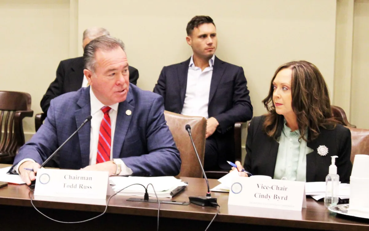 (Left) Oklahoma State Treasurer Todd Russ and (Right) Oklahoma State Auditor and Inspector Cindy Byrd during the Sept. 12, 2023 Oklahoma State Pension Commission meeting in Oklahoma City. (Michael Clements/The Epoch Times)