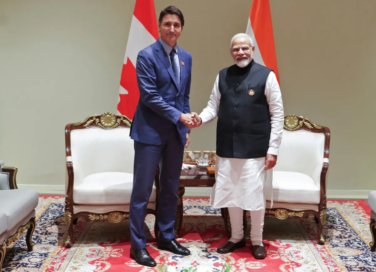 India's Prime Minister Narendra Modi (R) and his Canada counterpart Justin Trudeau shake hands during a bilateral meeting after the G20 Summit in New Delhi on Sept. 10, 2023. (-/PIB/AFP via Getty Images)