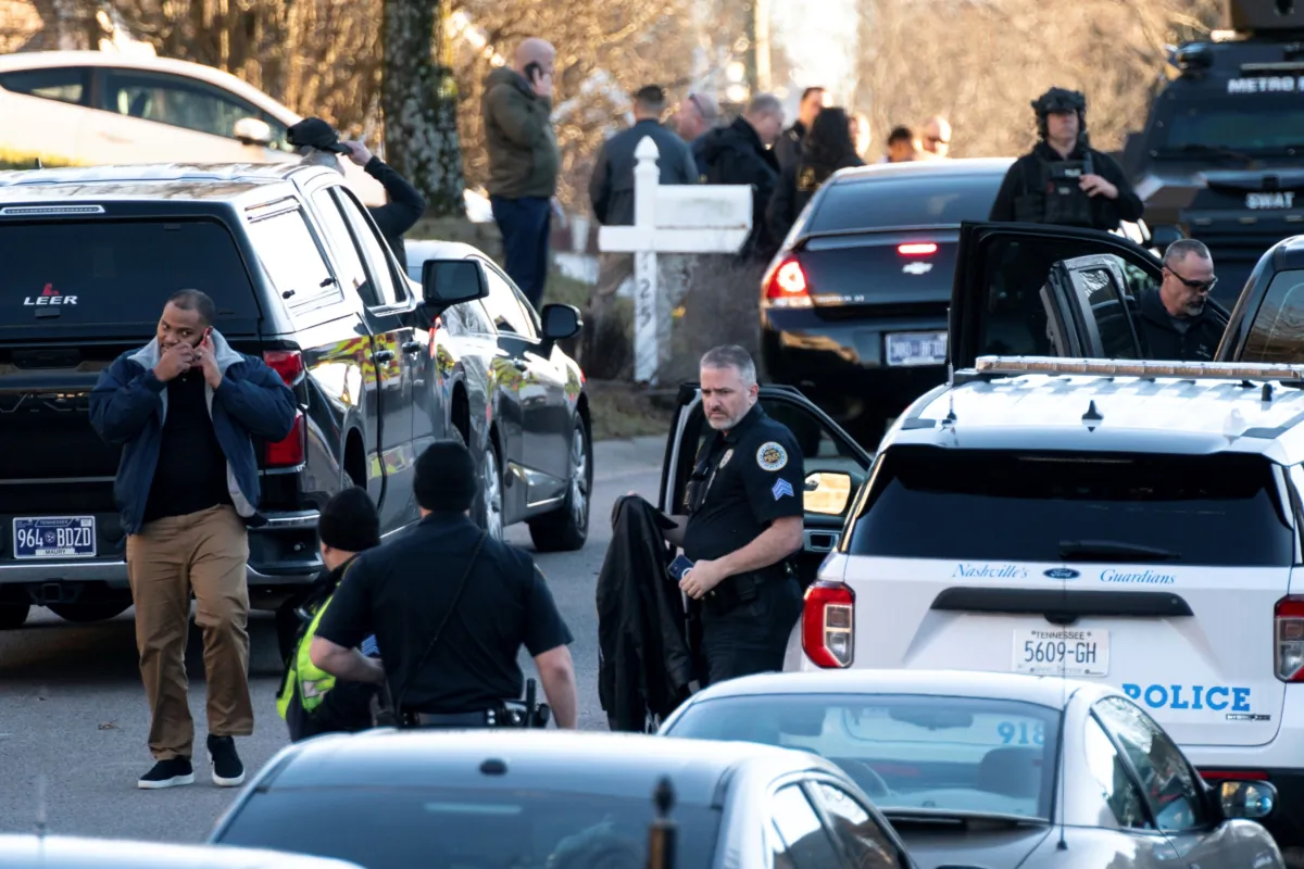 Nashville police gather at the scene after a Metro Nashville police officer shot and killed Grammy-winning sound engineer Mark Capps in Nashville, Tenn., on Jan. 5, 2023. (Andrew Nelles/The Tennessean via AP)