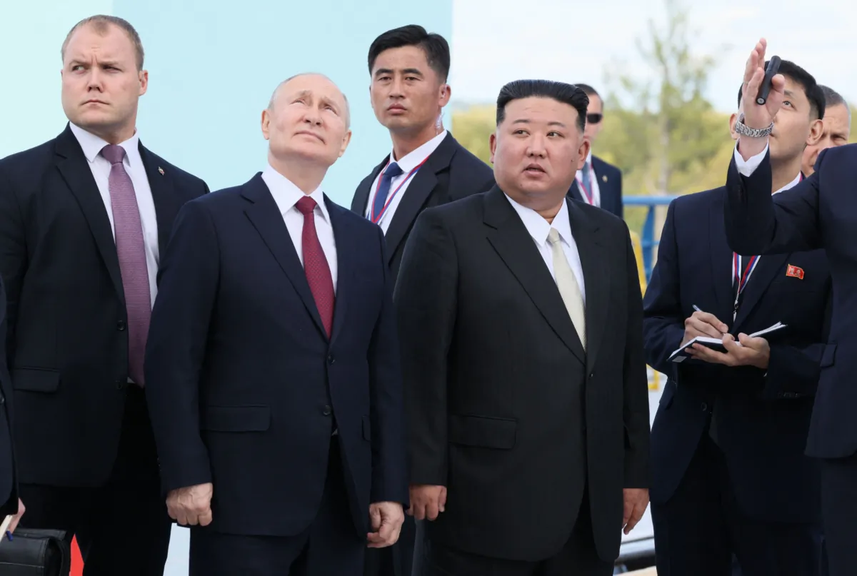 Russian President Vladimir Putin (2nd left) and North Korea's leader Kim Jong Un (4th left) visit the Vostochny Cosmodrome, in the Amur region of Russia, on Sept. 13, 2023. (Mikhail Metzel/POOL/AFP via Getty Images)