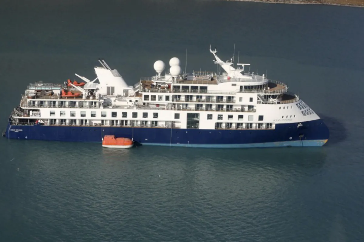 The Ocean Explorer, a Bahamas-flagged Norwegian cruise ship with 206 passengers and crew, which has run aground in northwestern Greenland, on Sept. 12, 2023. (Danish Air Force/Joint Arctic Command via AP)
