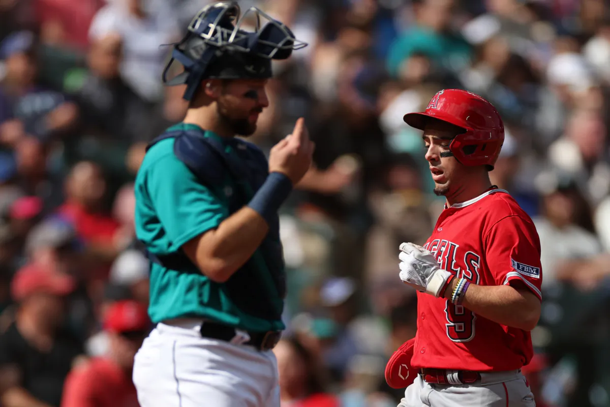 Zach Neto (9) of the Los Angeles Angels scores a run against the Seattle Mariners during the fourth inning at T-Mobile Park in Seattle on Sept. 13, 2023. (Steph Chambers/Getty Images)