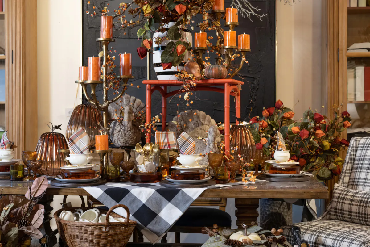 This tablescape nods to Halloween while celebrating autumn. (Handout/TNS)
