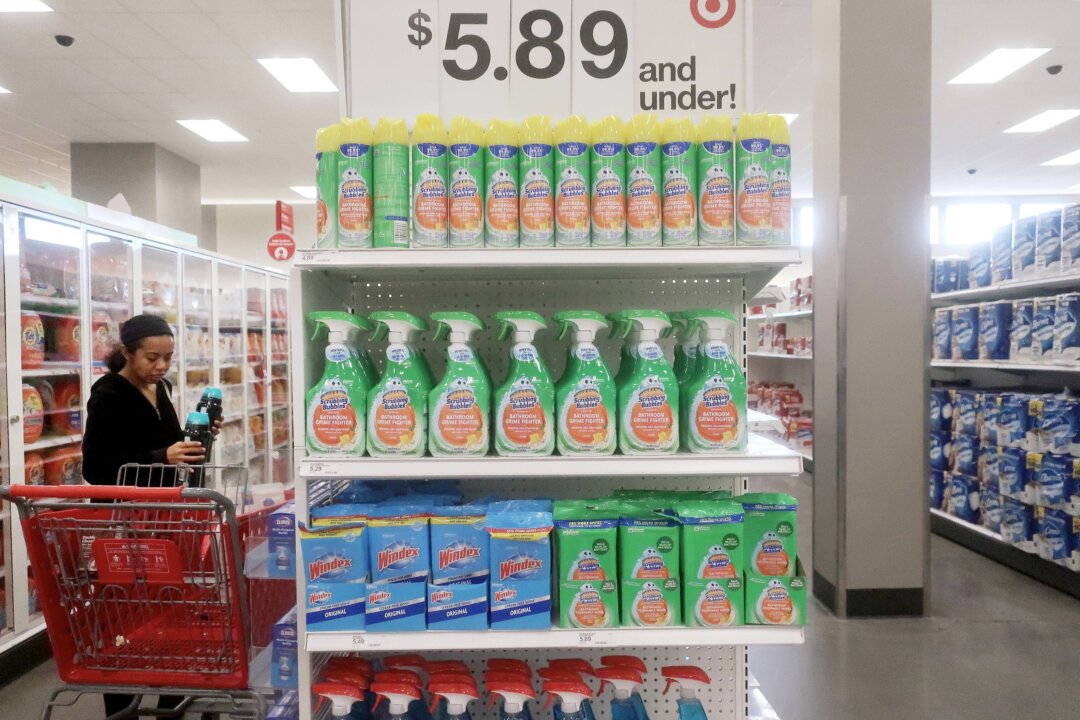 A person shops near a display of cleaning products in a Target store in Los Angeles, California, on Feb. 13, 2023. (Mario Tama/Getty Images)