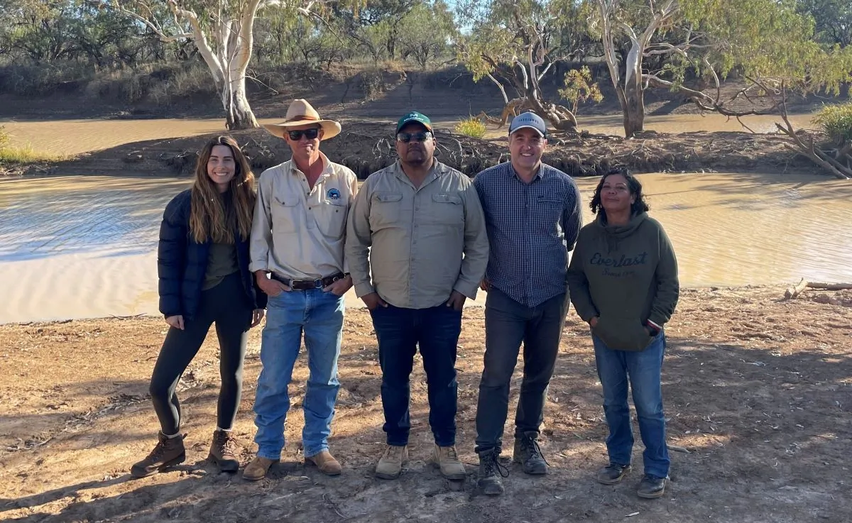 A supplied image obtained on Thursday, September 14, 2023, of those involved in the sale of the station pose for a photo at Thargomindah Station Left to right: Casey Taylor – Conscious Investment Management; Adam Klein – former owner of Thargomindah Station Ronald Saltner – Kullilli Bulloo River Aboriginal Corporation; Glenn Kvassay – Climate Friendly Cassandra Stevens – Kullilli Bulloo River Aboriginal Corporation, at Thargomindah Station, south western QLD. (AAP Image/Supplied)