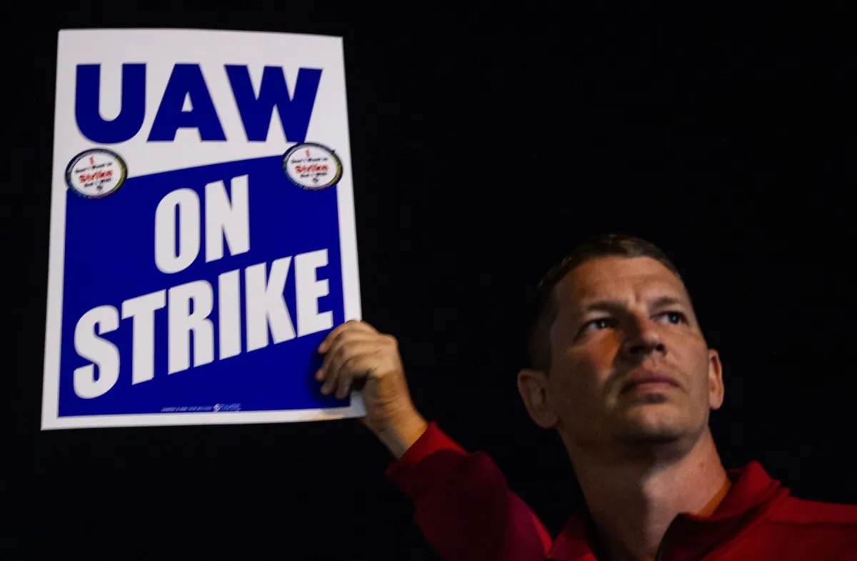 Members of the United Auto Workers (UAW) picket outside of the UAW Local 900 headquarters across the street from the Ford Assembly Plant in Wayne, Mich., on Sept. 15, 2023. (Matthew Hatcher/AFP via Getty Images)