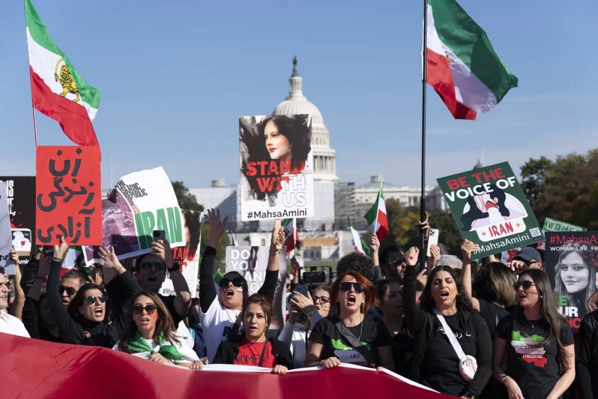 Following the death of Mahsa Amini, demonstrators rally at the National Mall in Washington to protest against the Iranian regime on Oct. 22, 2022. (The Canadian Press/AP-Jose Luis Magana)
