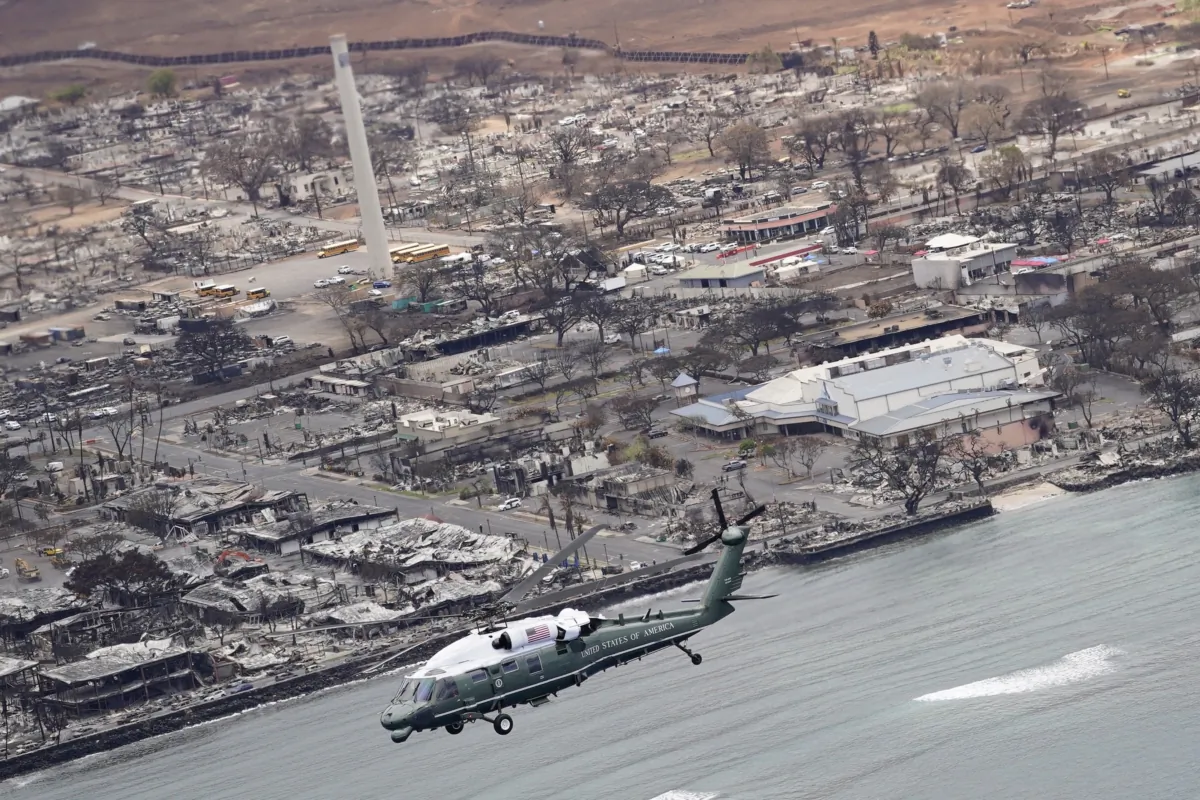 President Joe Biden and first lady Jill Biden take an aerial tour on Marine One over areas devastated by the Maui wildfires in Lahaina, Hawaii, on Aug. 21, 2023. (Evan Vucci/AP Photo)