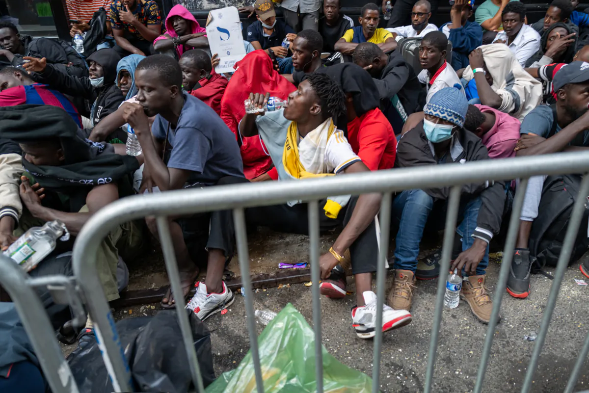 Unvetted immigrants camp outside of the Roosevelt Hotel, which has been made into a reception center in New York City on Aug. 1, 2023. (Spencer Platt/Getty Images)