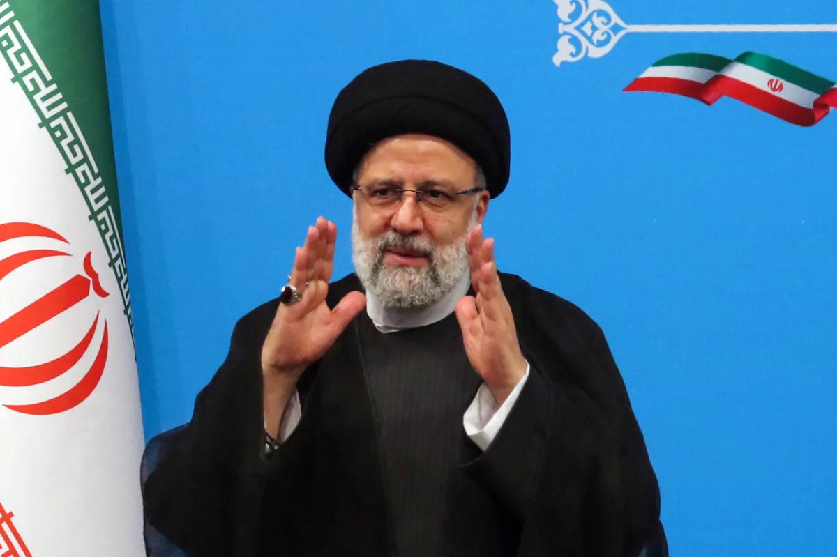Iran's President Ebrahim Raisi greets media representatives after a press conference in Tehran, on Aug. 29, 2023. (AFP via Getty Images)