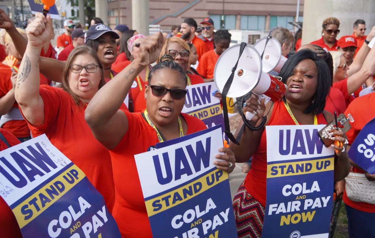 UAW strikers rally for the restoration of cost-of-living adjustments in downtown Detroit on Sept. 15, 2023. (Steven Kovac/The Epoch Times)