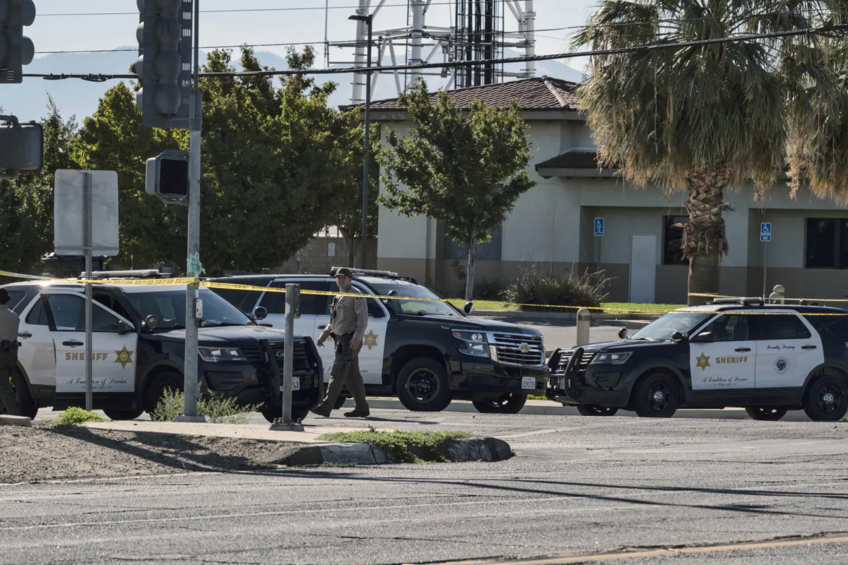 Sheriff's deputies block off a street where a deputy was fatally wounded in Palmdale, Calif., on Sept. 17, 2023. The Los Angeles County Sheriff's Department deputy died after he was shot in his patrol car by an unknown assailant on Sept. 16. (Richard Vogel/AP Photo)