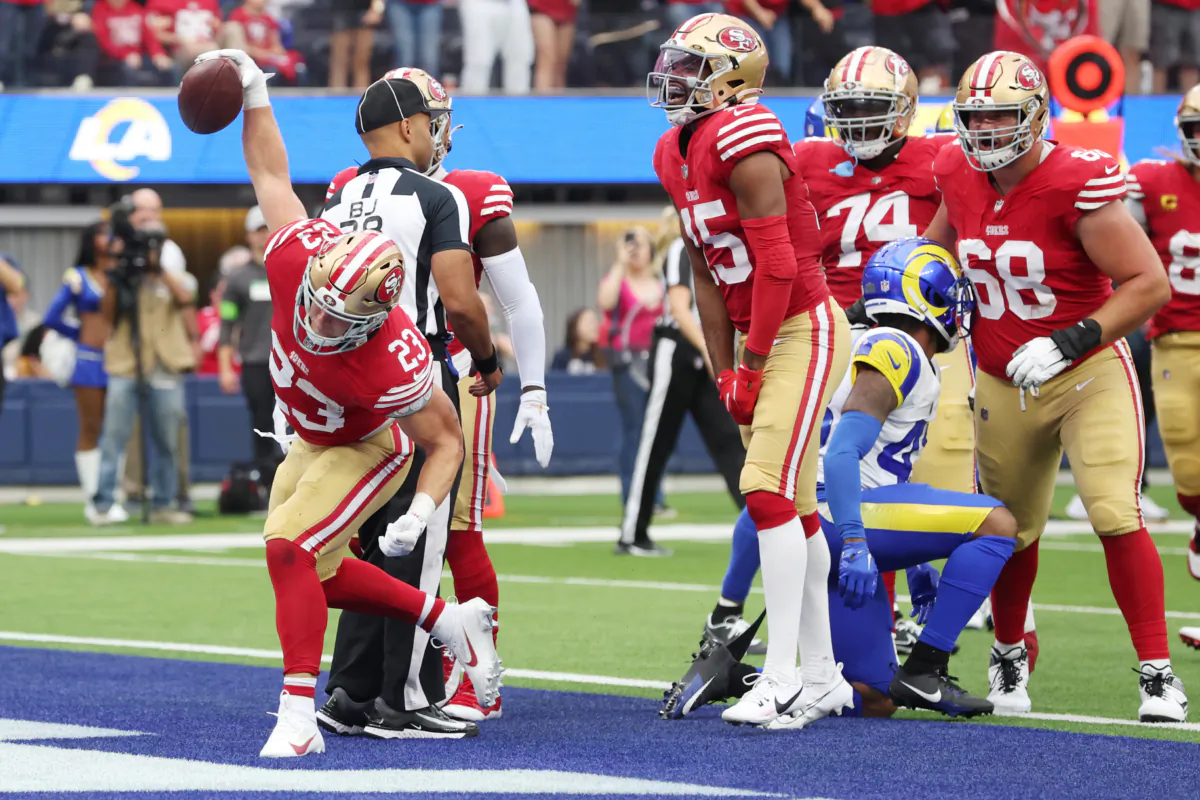Christian McCaffrey (23) of the San Francisco 49ers reacts to a touchdown during the first quarter against the Los Angeles Rams in Inglewood, Calif., at SoFi Stadium on Sept. 17, 2023. (Sean M. Haffey/Getty Images)
