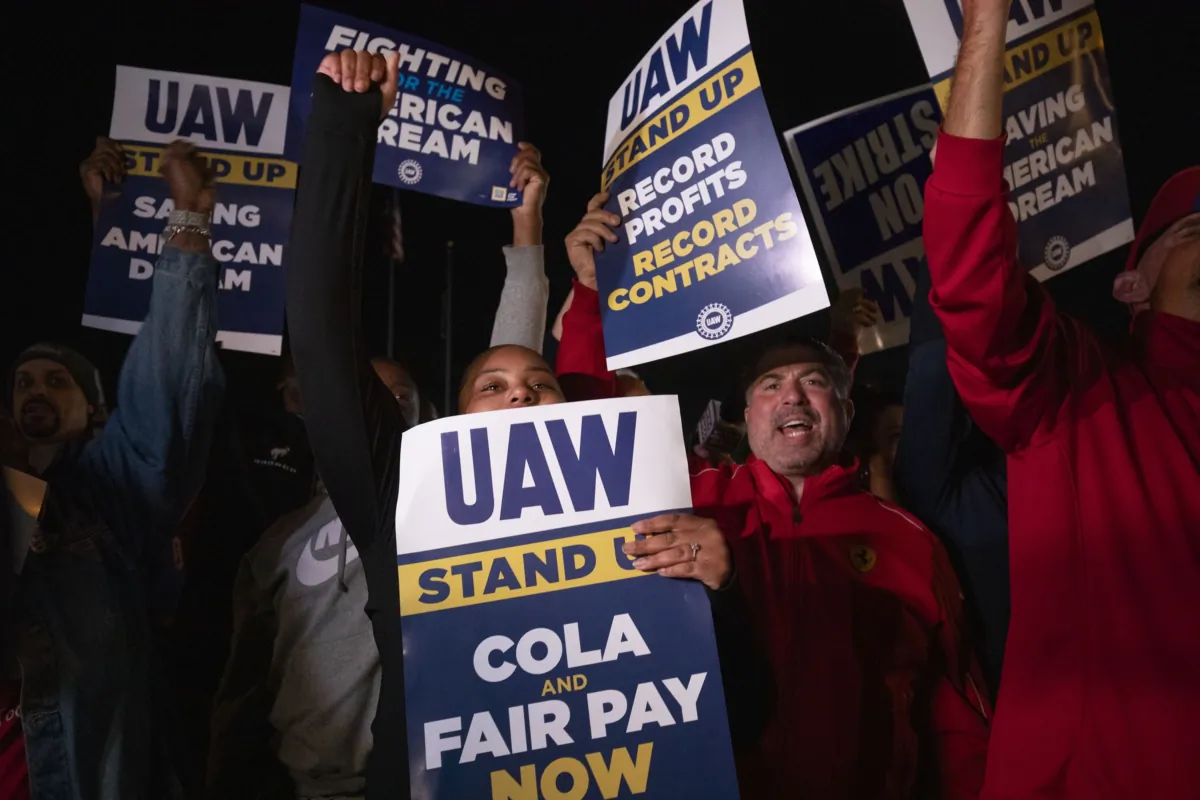 Supporters and workers cheer as United Auto Workers members go on strike at the Ford Michigan Assembly Plant in Wayne, Mich., on Sept. 15, 2023. (Bill Pugliano/Getty Images)