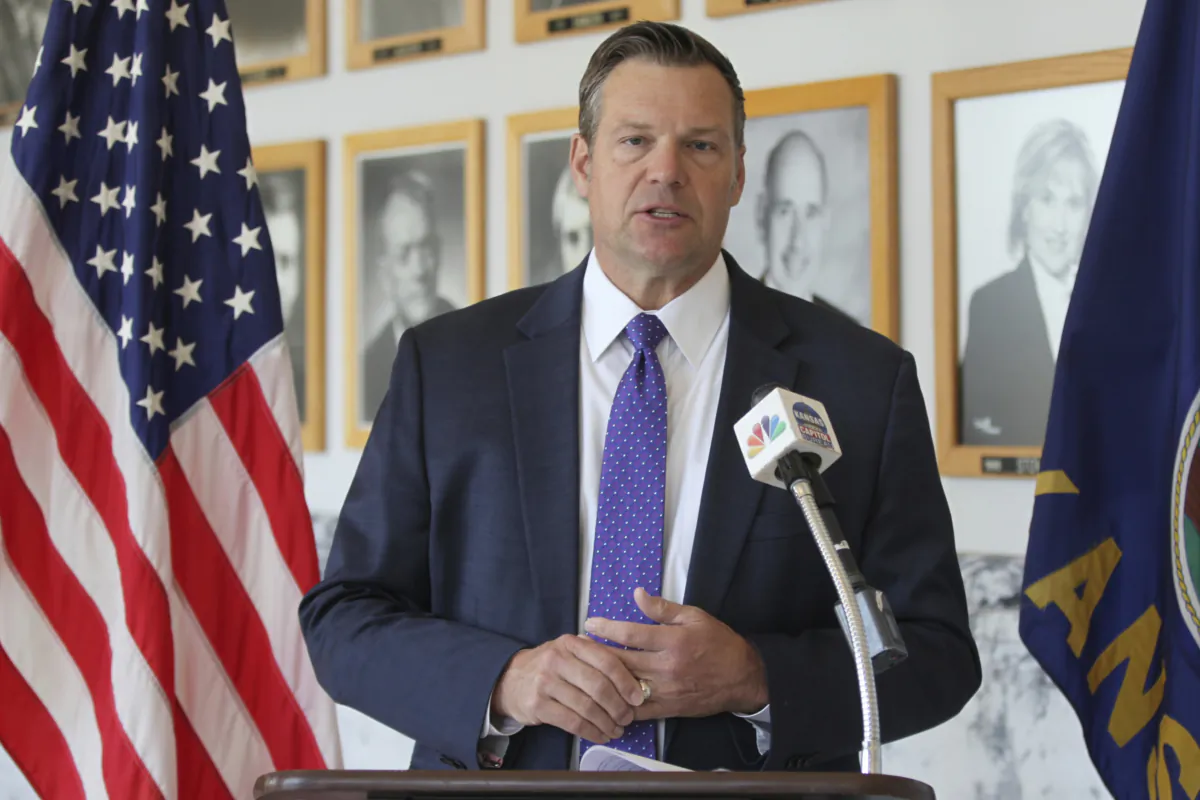 Kansas Attorney General Kris Kobach answers questions from reporters during a news conference outside his office in Topeka, Kan., on May 1, 2023. (John Hanna/AP Photo)