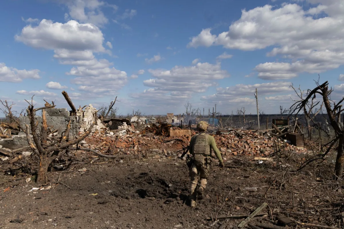 An assault unit commander from the 3rd Assault Brigade runs to his position at the frontline in Andriivka, Donetsk region, Ukraine, on Sept. 16, 2023. (Alex Babenko/AP Photo)