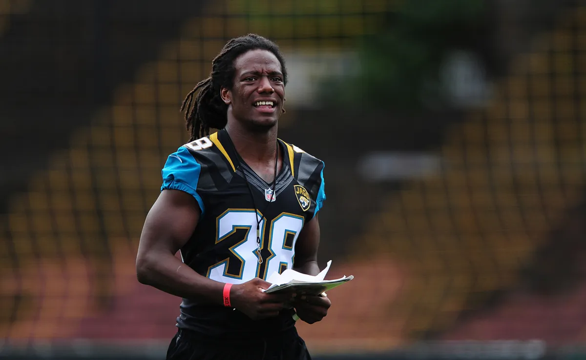 Sergio Brown of the Jacksonville Jaguars helps to coach a team of local school children during the NFL Launch of the Play 60 scheme at the Black Prince Community Hub in London on July 15, 2015. (Dan Mullan/Getty Images)