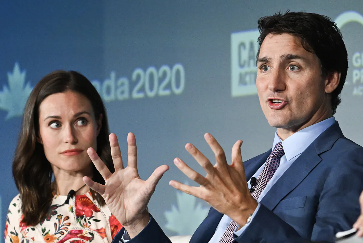 Prime Minister Justin Trudeau takes part in a leaders panel discussion alongside Sanna Marin, former prime minister of Finland, at the Global Progress Action Summit in Montreal on Sept. 16, 2023. (Graham Hughes/The Canadian Press)