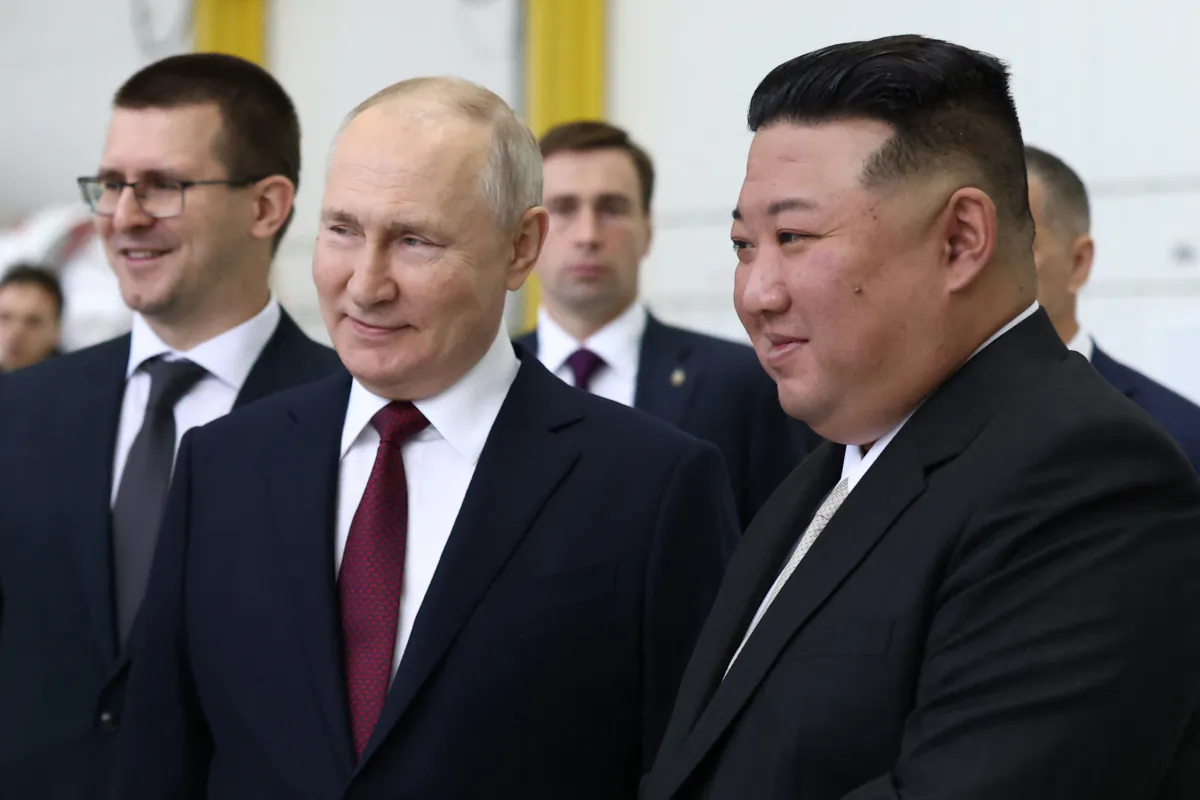 In this pool photog distributed by Sputnik agency, Russia's President Vladimir Putin (L) and North Korea's leader Kim Jong Un (R) visit the Vostochny Cosmodrome in Amur region on September 13, 2023. Russian President Vladimir Putin and North Korean leader Kim Jong Un both arrived at the Vostochny Cosmodrome in Russia's Far East, Russian news agencies reported on September 13, ahead of planned talks that could lead to a weapons deal. (VLADIMIR SMIRNOV/POOL/AFP via Getty Images)