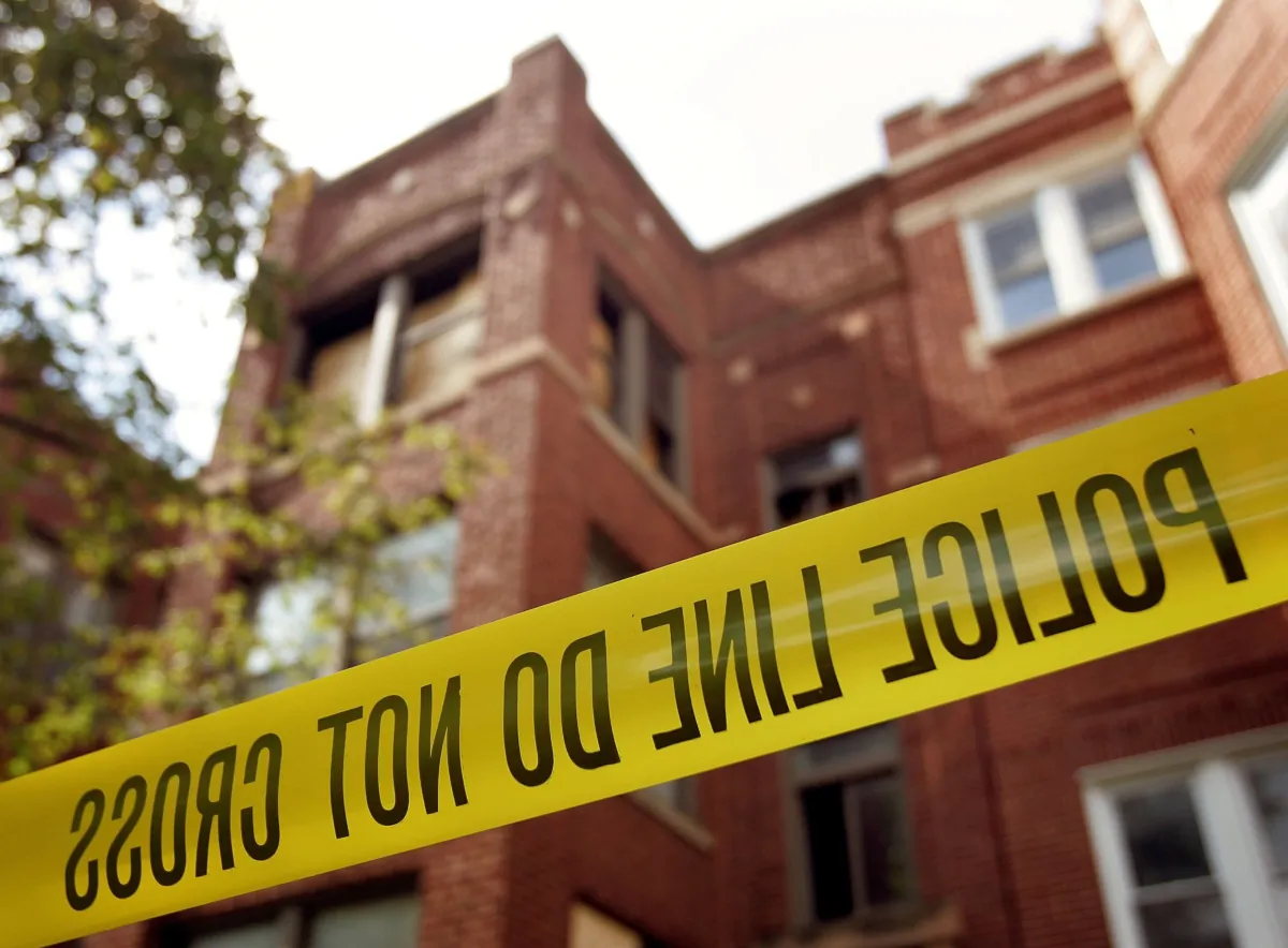 Police tape lines in a file photo. (Tim Boyle/Getty Images)