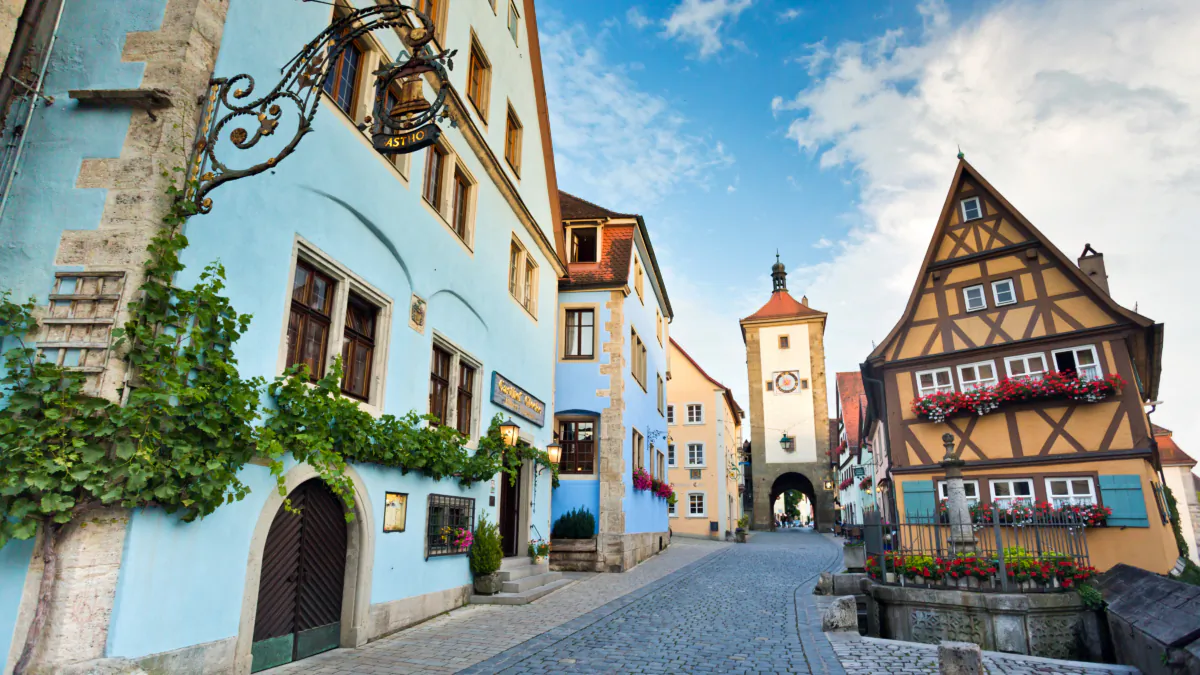 Picturesque Rothenburg, with its pastel buildings, uniform rooflines, and flower boxes, is also famous for its unique people. (Dominic Arizona Bonuccelli/TNS)