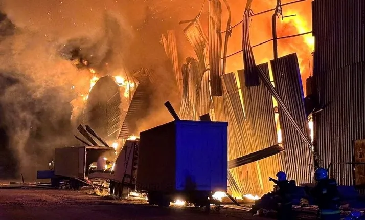 Firefighters work at a site of an industrial warehouse damaged by a Russian drone strike, amid Moscow's attack on Ukraine, in Lviv, on Sept. 19, 2023. (State Emergency Service of Ukraine/Handout via Reuters)