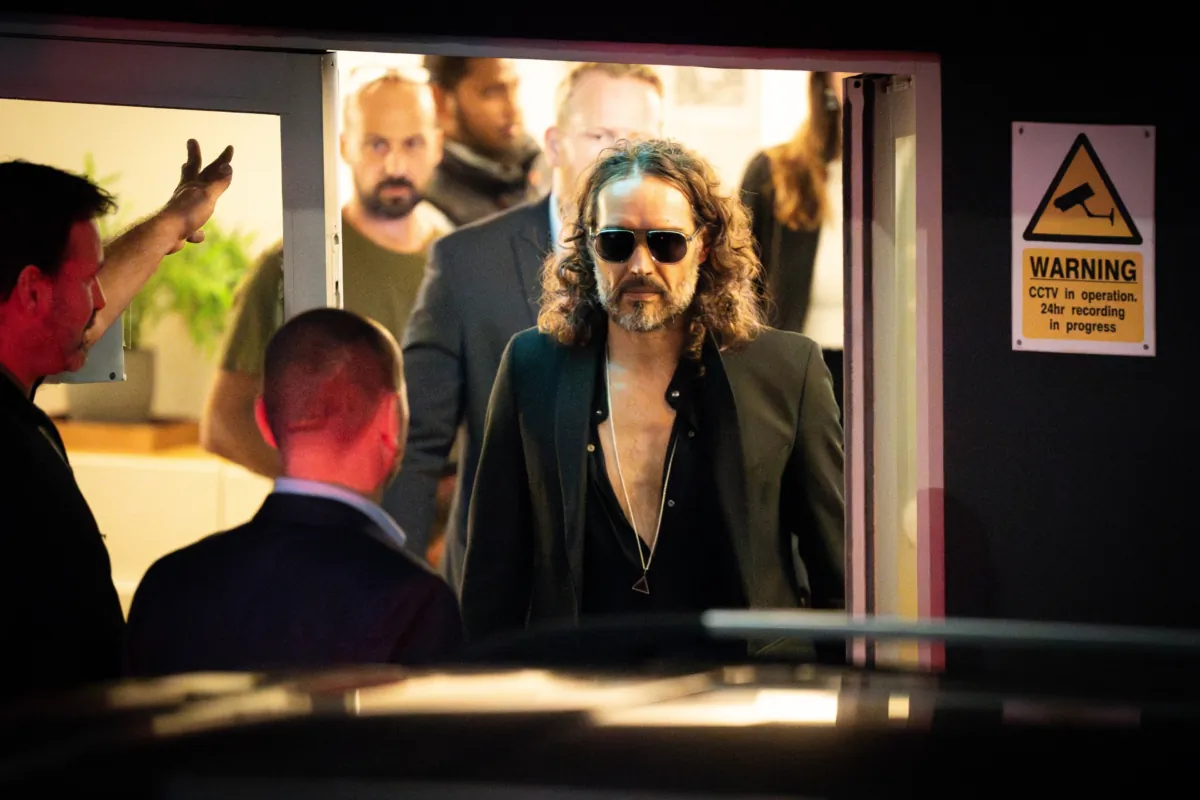 Russell Brand leaves the Troubabour Wembley Park theatre in northwest London after performing a comedy set on Sept. 16, 2023. (James Manning/PA)

