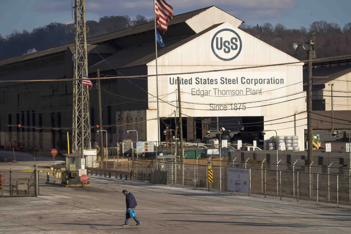 A worker leaves the U.S. Steel Corporation in Braddock, Pa., on March 10, 2018. (Drew Angerer/Getty Images)