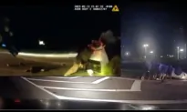 Video Footage: Georgia Police Officer, Bystanders Lift Car Off Teen Driver