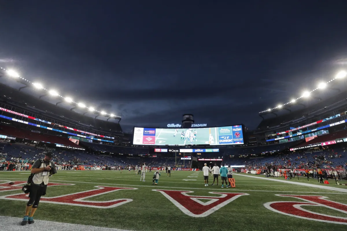 Lights illuminate Gillette Stadium before an NFL football game between the New England Patriots and the Miami Dolphins in Foxborough, Mass., on Sept. 17, 2023. (Michael Dwyer/AP Photo)