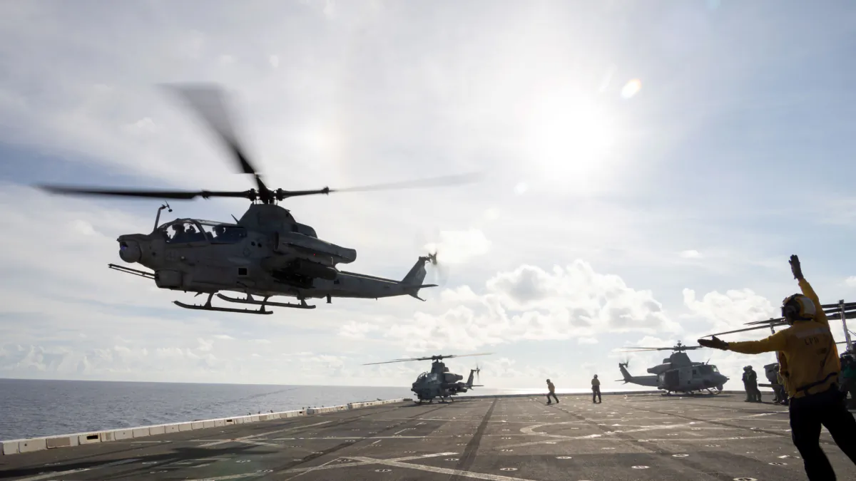 A U.S. Marine Corps AH-1Z Viper helicopter takes off during an air defense drill aboard the amphibious dock landing ship USS Green Bay (LPD 20) in the Pacific Ocean on Sept. 17, 2023. (U.S. Marine Corps/Cpl. Christopher Lape)