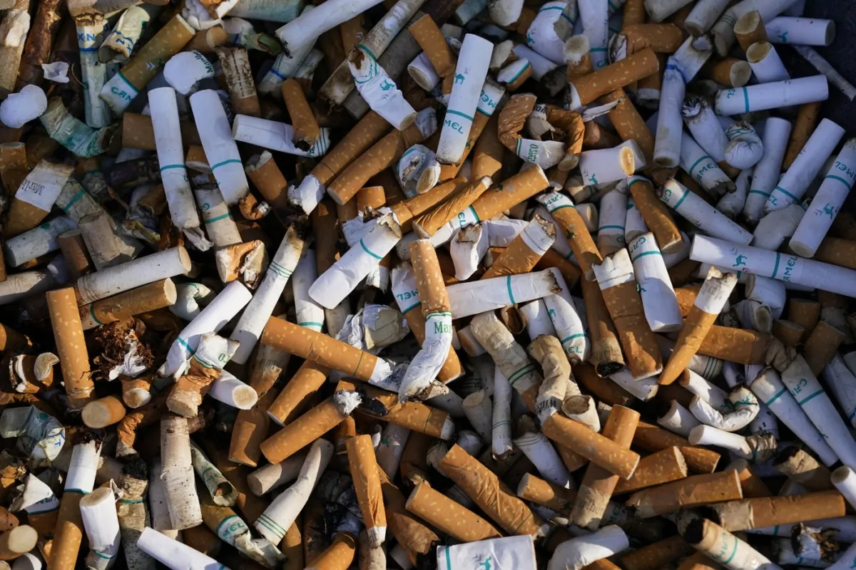 Cigarette butts fill a smoking receptacle outside a federal building in Washington, on April 15, 2021. (The Canadian Press/AP/J. Scott Applewhite)