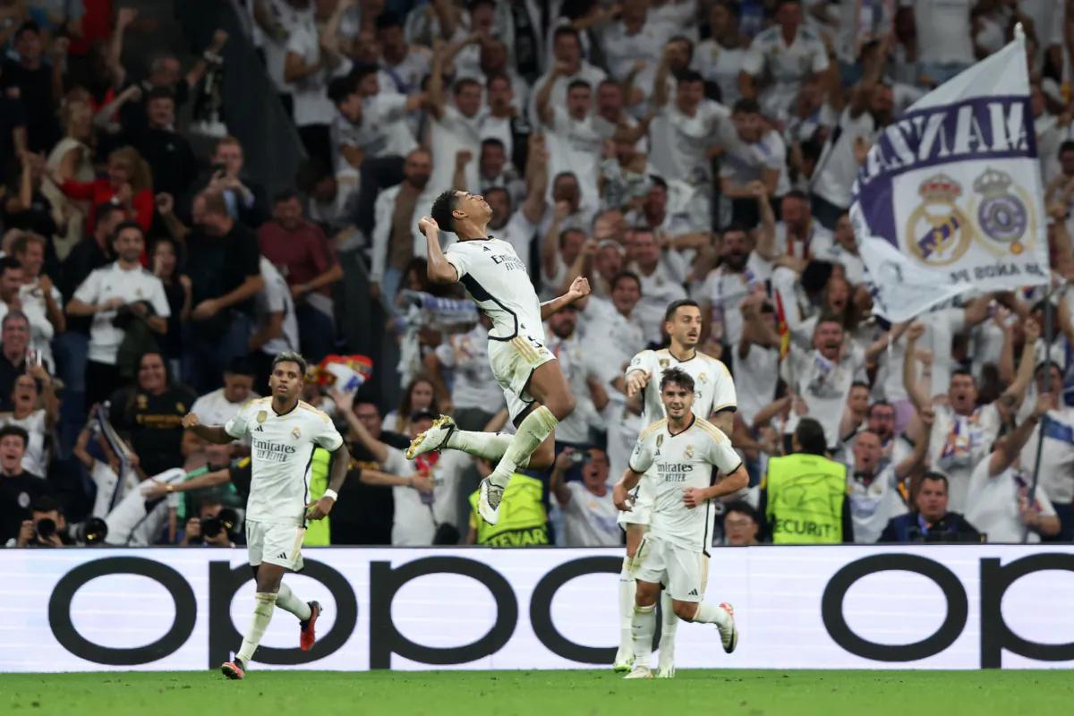 Jude Bellingham of Real Madrid CF jumps as he celebrates scoring their opening goal during the UEFA Champions League match between Real Madrid CF and Union Berlin at Estadio Santiago Bernabeu in Madrid, Spain on Sept. 20, 2023. (Gonzalo Arroyo Moreno/Getty Images)
