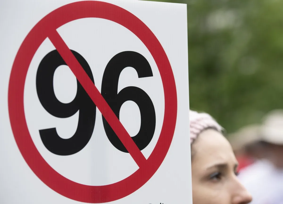 People take part in a protest against Bill 96 in Montreal, on May 26, 2022. (The Canadian Press/Graham Hughes)