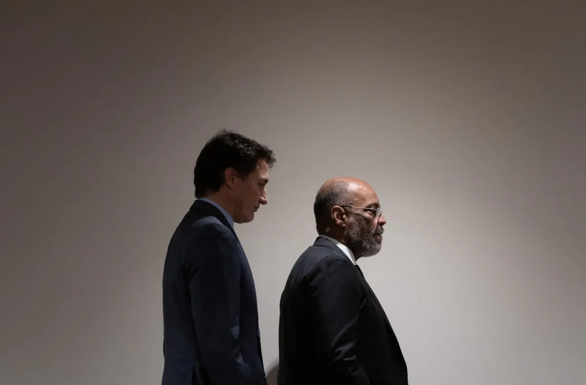 Prime Minister Justin Trudeau walks with Haitian Prime Minister Ariel Henry to an event focusing on Haiti at the United Nations, in New York, on Sept. 21, 2023. (The Canadian Press/Adrian Wyld)