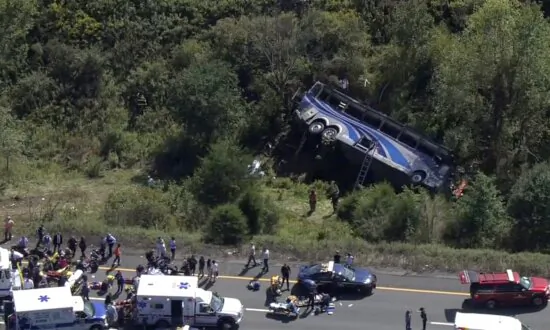 Bus Carrying High School Students to Band Camp Crashes, Killing 2 and Seriously Injuring Others
