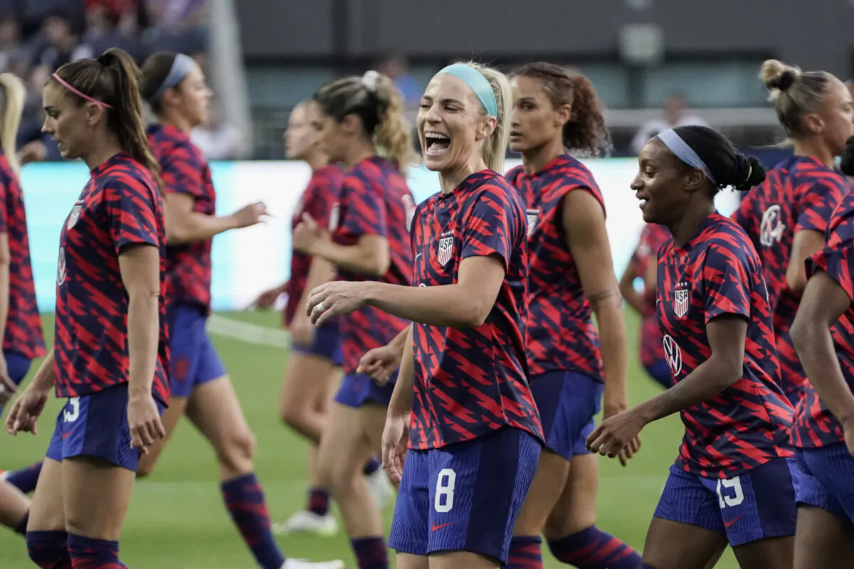 U.S. midfielder Julie Ertz (C) laughs while warming up with teammates before an international friendly soccer match against South Africa in Cincinnati on Sept. 21, 2023. (Joshua A. Bickel/AP Photo)