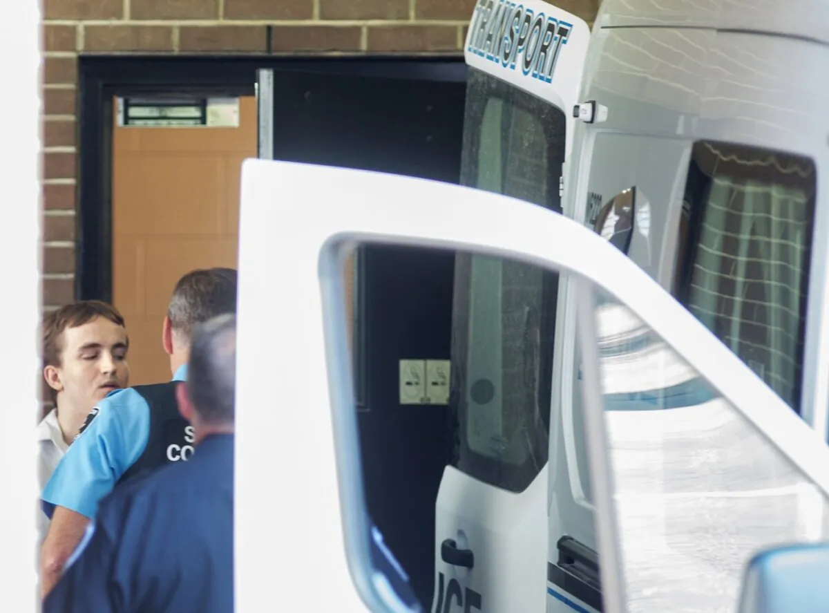 Nathaniel Veltman is escorted outside Ontario Superior Court in Windsor, Ont., on Sept. 5, 2023. (The Canadian Press/Dax Melmer)