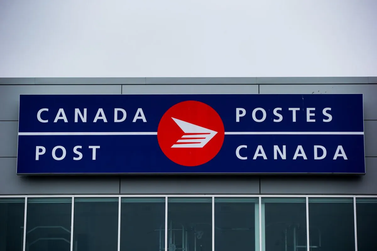 The Canada Post logo is seen on the outside the company's Pacific Processing Centre, in Richmond, B.C., on June 1, 2017. (The Canadian Press/Darryl Dyck)