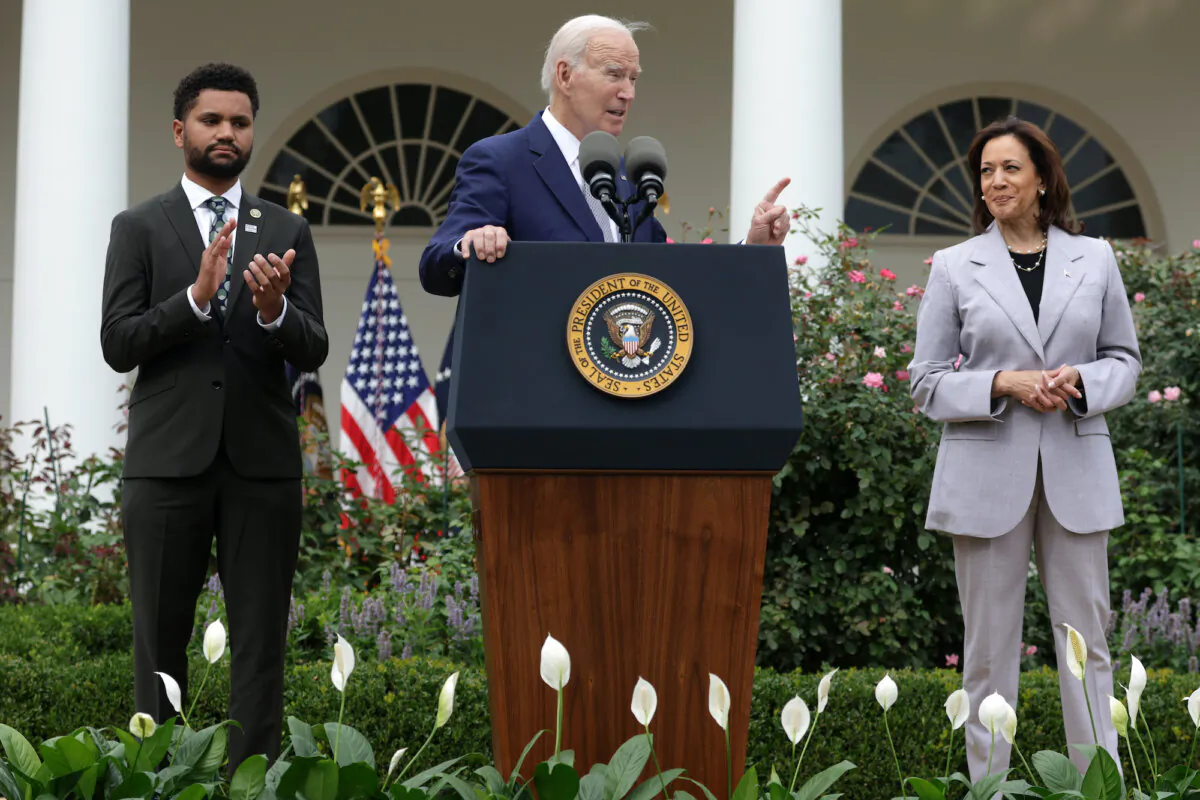 President Joe Biden (C) speaks as Rep. Maxwell Frost (D-Fla.) and Vice President Kamala Harris listen during a Rose Garden event on gun safety at the White House in Washington on Sept. 22, 2023. (Alex Wong/Getty Images)