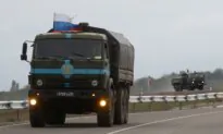Russia Says Karabakh Armenian Fighters Start Giving Up Arms