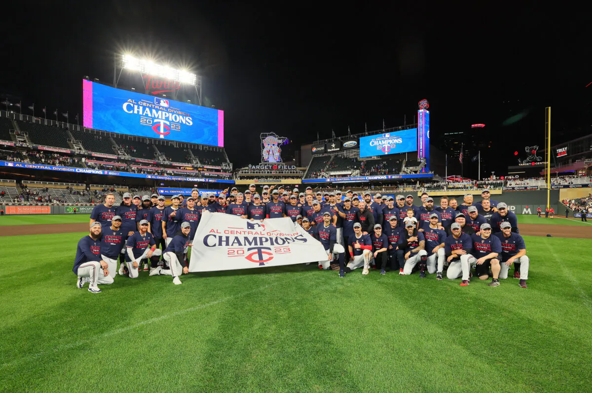 The Minnesota Twins pose on the field after the game against the Los Angeles Angels at Target Field in Minneapolis on Sept. 22, 2023. (Adam Bettcher/Getty Images)