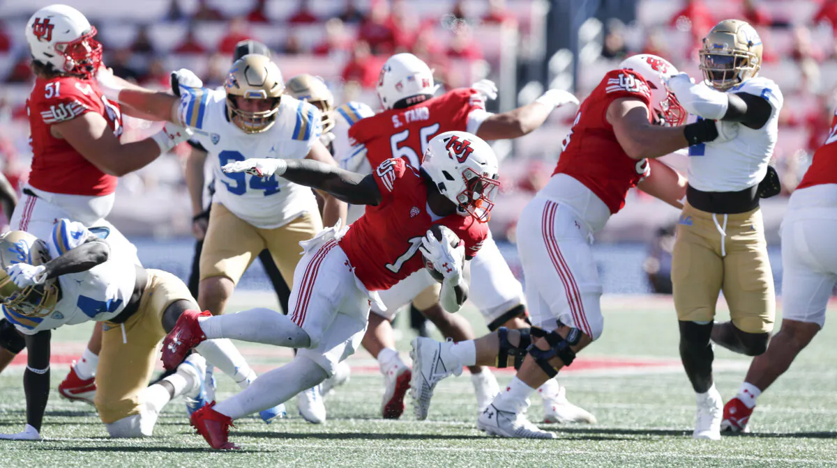 Jaylon Glover (1) of the Utah Utes runs the ball against the UCLA Bruins during the second half of their game at Rice-Eccles Stadium in Salt Lake City on Sept. 23, 2023. (Chris Gardner/Getty Images)