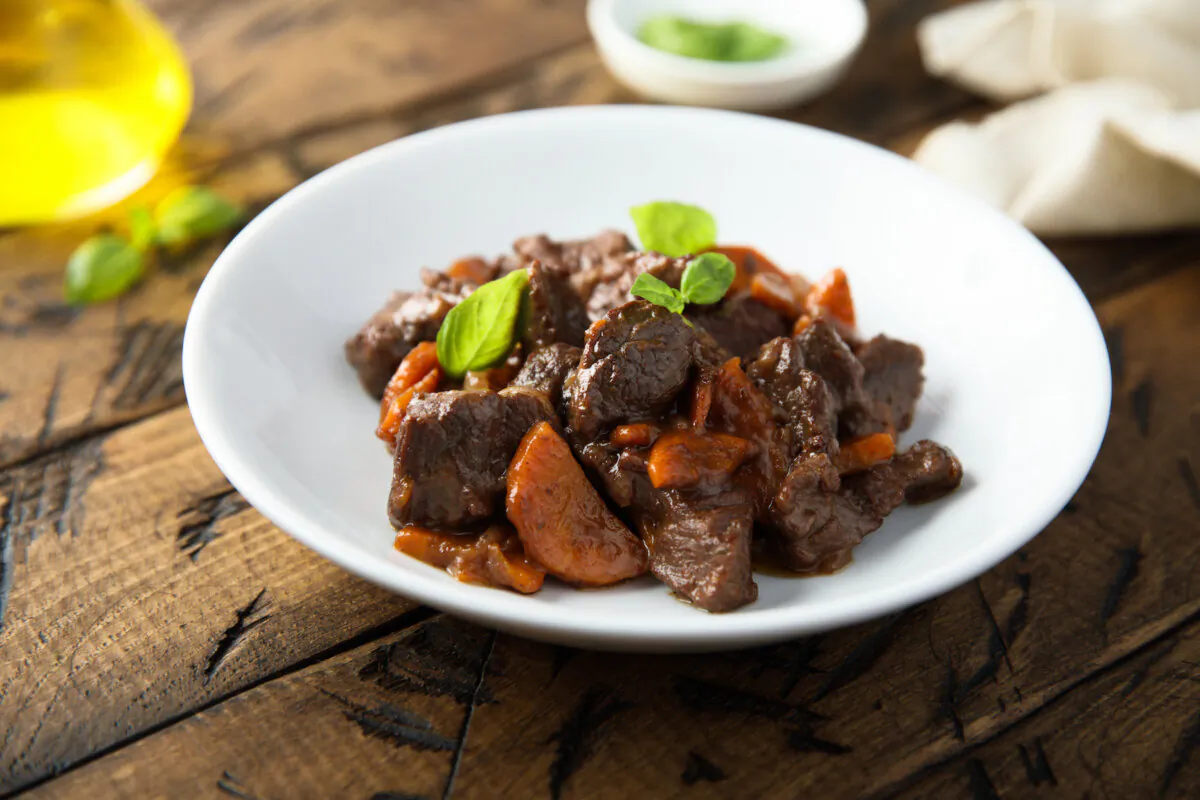 Veal slowly cooked with vegetables, herbs and red wine makes a tasty ragout or stew. (MariaKovaleva/Shutterstock)