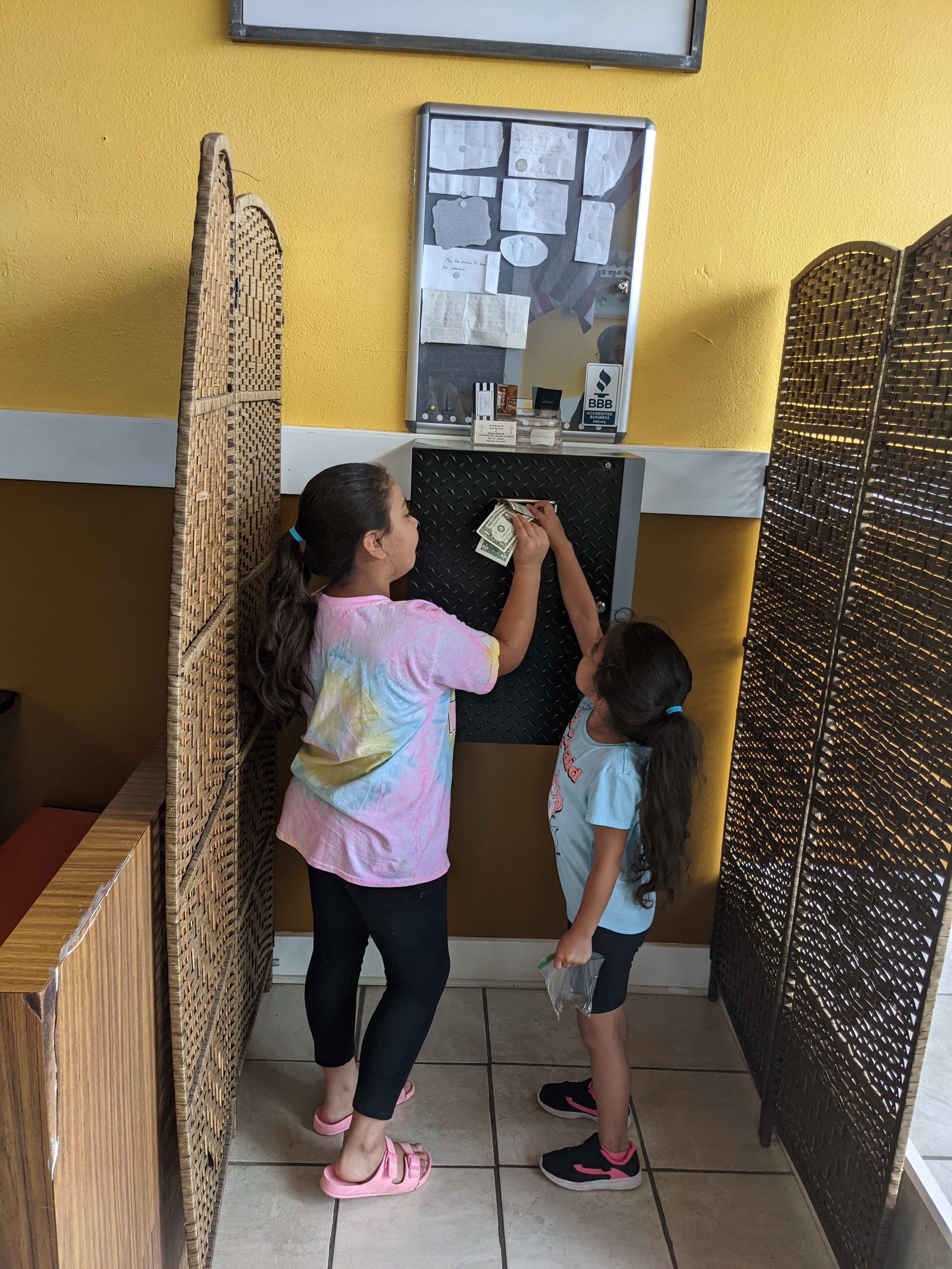 The donation box is hidden behind a privacy screen. (Courtesy of Drexell & Honeybee's)