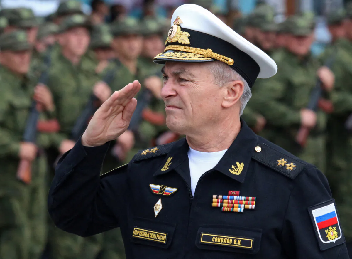 Commander of the Russian Black Sea Fleet Vice-Admiral Viktor Sokolov salutes during a send-off ceremony for reservists drafted during partial mobilization in Sevastopol, Crimea, on Sept. 27, 2022. (Alexey Pavlishak/Reuters)