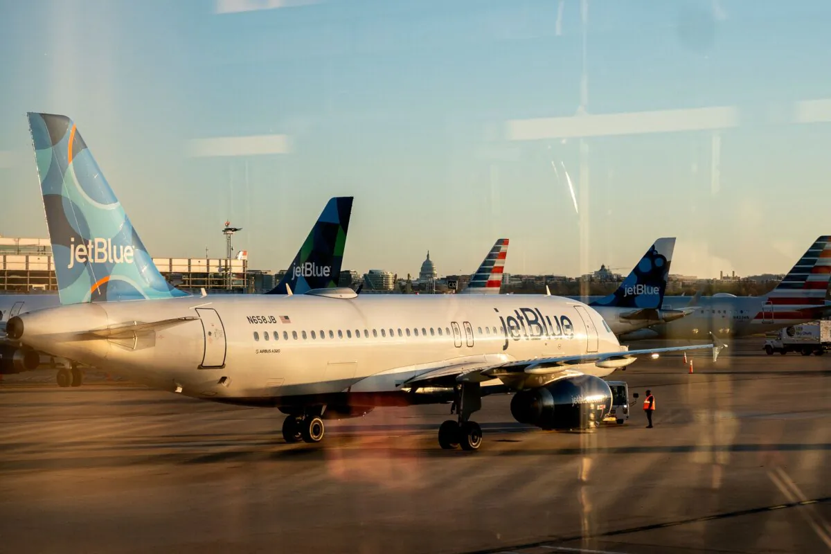 A JetBlue airplane at Ronald Reagan Washington National Airport in Arlington, Va., on March 9, 2023. (Stefani Reynolds/AFP via Getty Images)