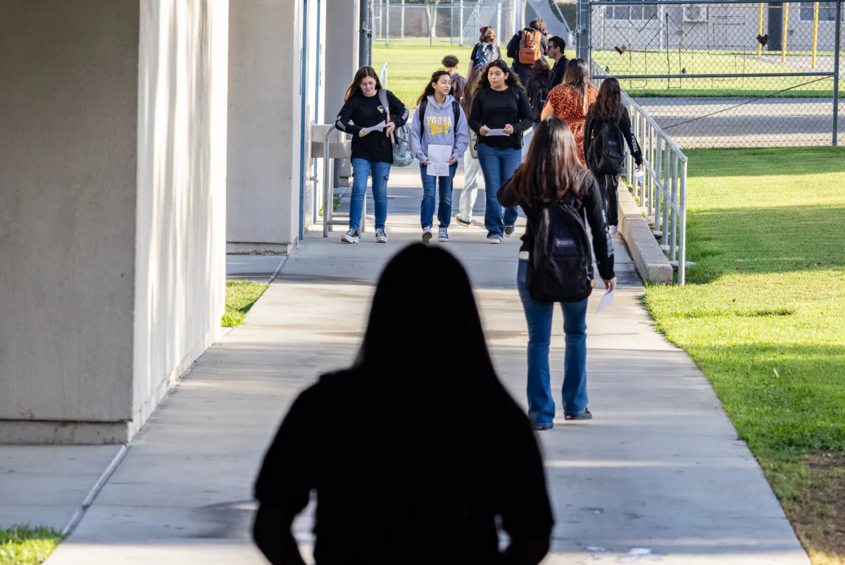 Teachers greet students on the first day of classes at Yorba Middle School in Orange, Calif., on Aug. 16, 2023. (John Fredricks/The Epoch Times)