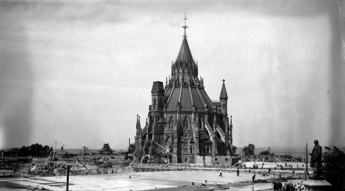 The Library of Parliament stands alone on Aug. 29, 1916, as construction of the Parliament Buildings continues after a catastrophic fire on Feb. 3 of that year. (CP Photo)